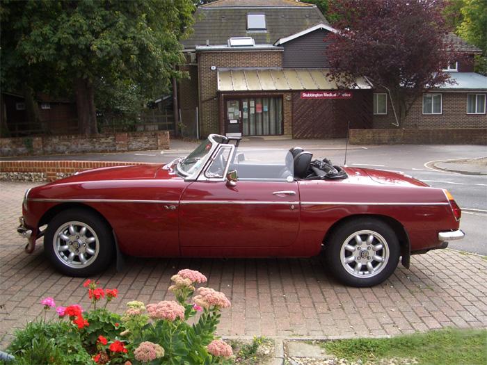 A new purchase of a V8 roadster replaces the kit car