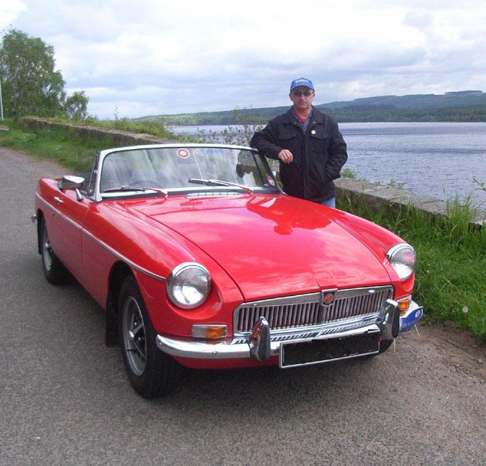 David with his 1971 MGB Roadster by the side of Loch Ness after the MG Club Scotland Trip May 2010