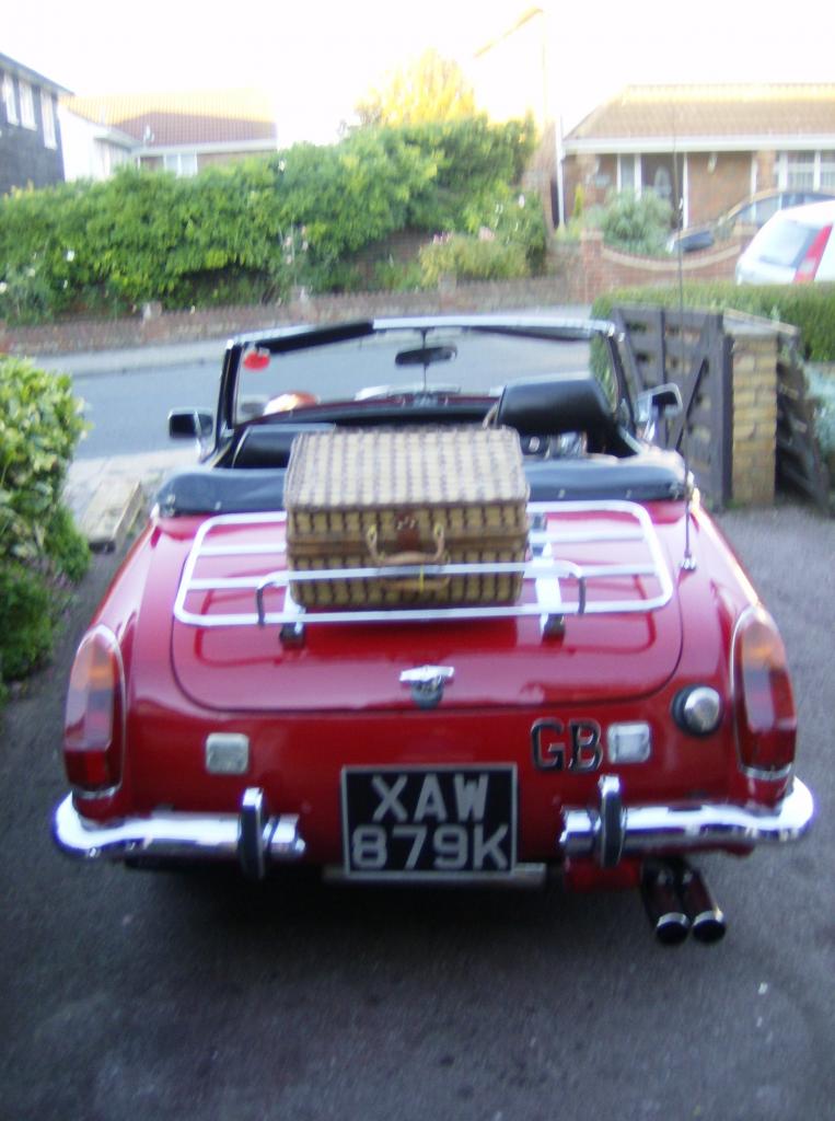 still useing my midget rain shine or snow with roof down how mad is that