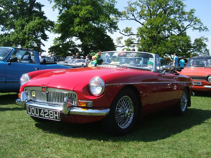 1970 MGB roadster, tartan red called Hamish. My first MG