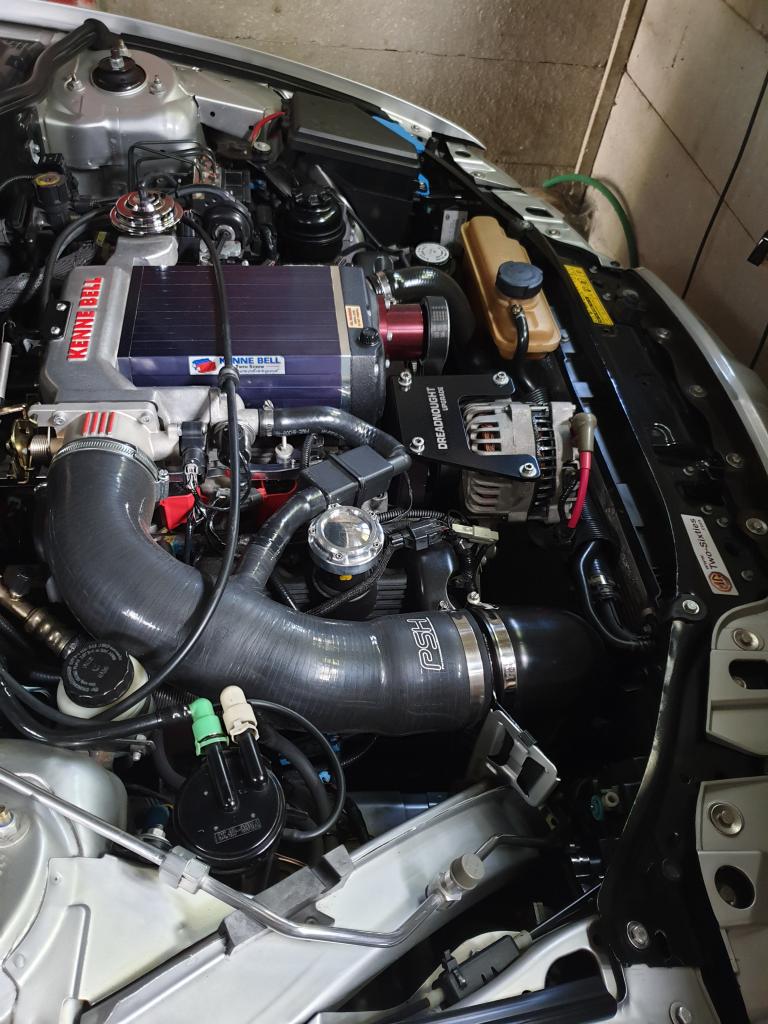 Kenniebell supercharger, bigger throttle body, blaster coils taking the car over 400hp 